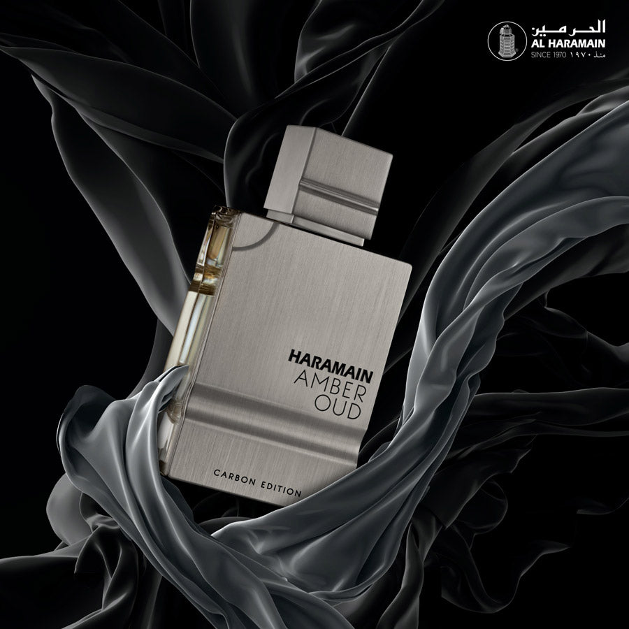 Al Haramain Amber Oud Carbon Edition Eau de Parfum for men, with a sleek metallic bottle and fresh aromatic woody notes.
