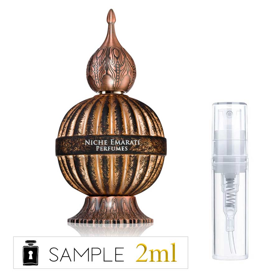 Lattafa Niche Emarati Antique original perfume bottle with a 2 ml perfume sample spray vial by Hidden Samples.
