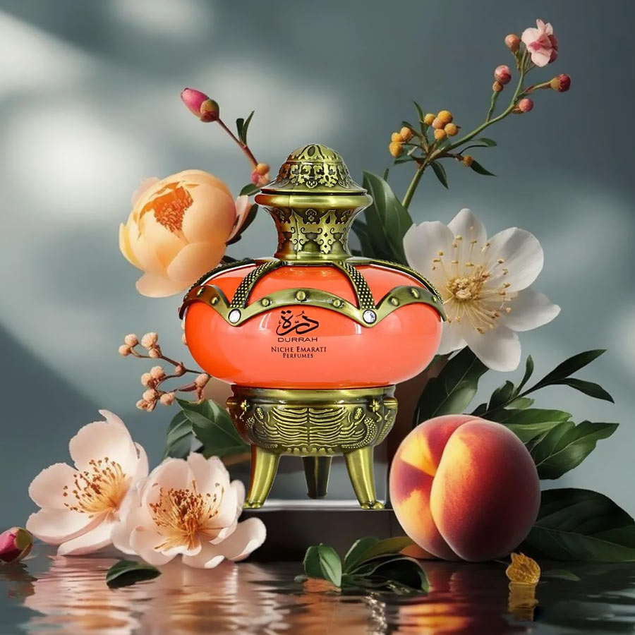 Durrah Niche Emarati perfume by Lattafa with floral and peach background