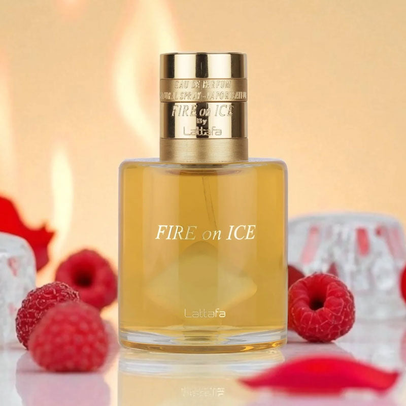 Lattafa Fire on Ice Eau de Parfum 100ml bottle with golden liquid surrounded by raspberries, ice cubes, and fiery background.