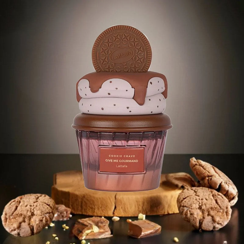 Cupcake-shaped container with cookies on top, featuring a brand label, on a wooden stand with cookies around.